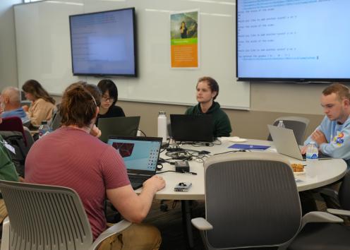 Students working on computers during class